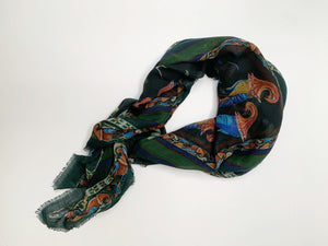 Made in Italy with attention to details. Self fringed scarf with birds that are inspired by ancient manuscripts